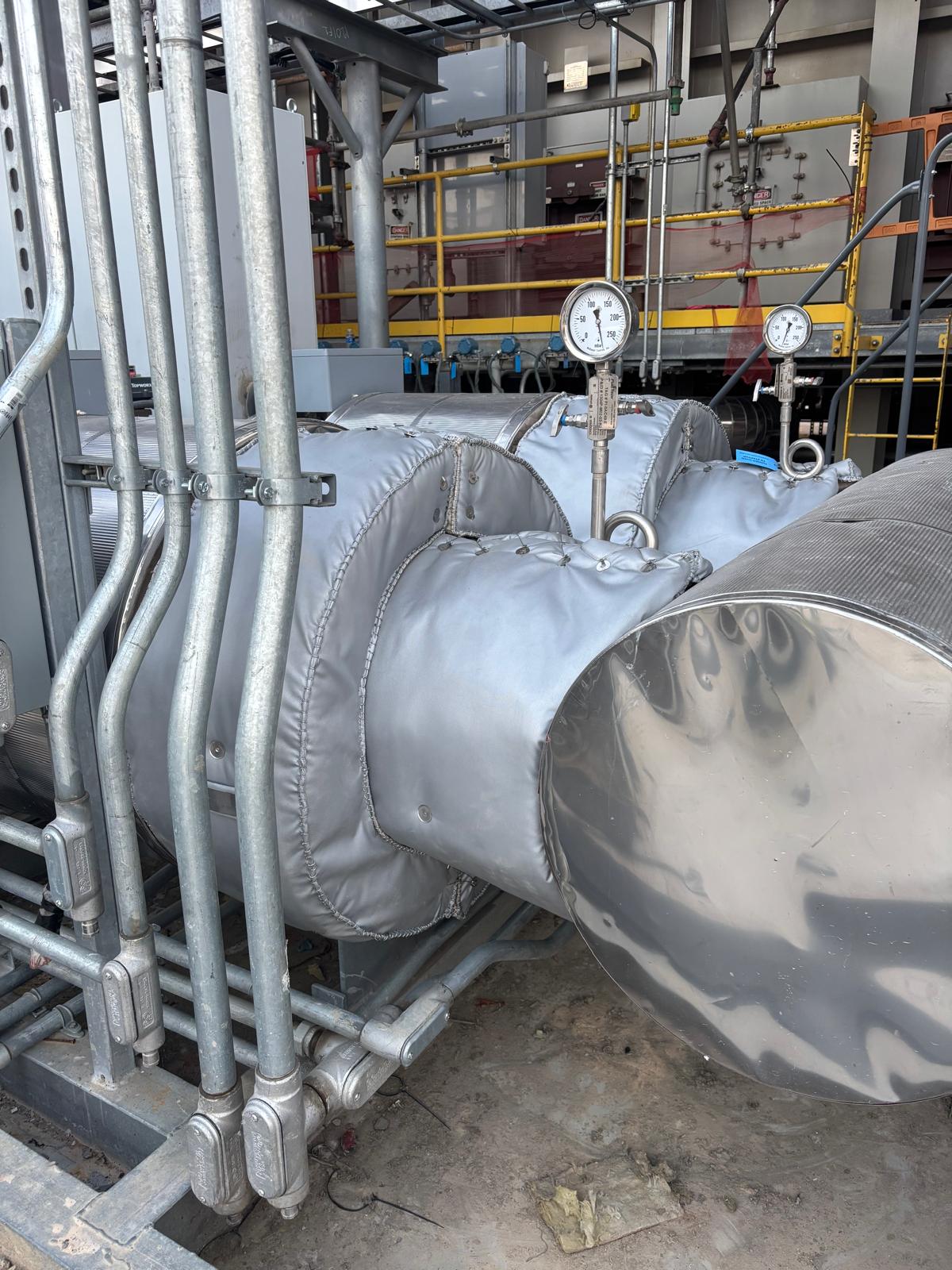 Custom valve insulation blanket installation at petrochemical plant