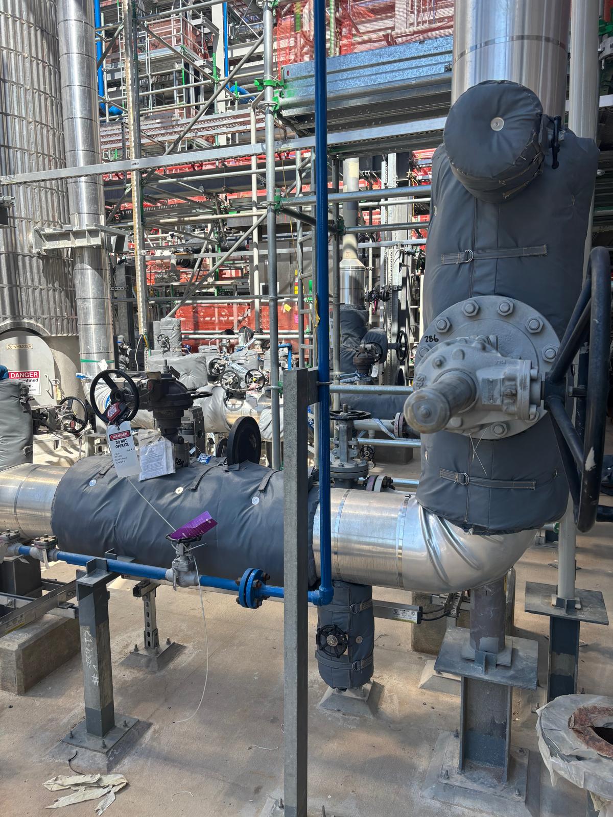 Valve and pipe insulation blankets on refinery equipment